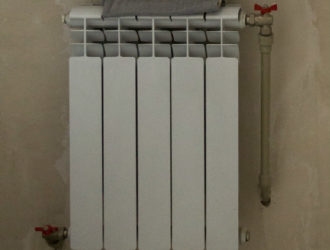 Биметаллические радиаторы отопления: виды, преимущества, расчет и монтаж